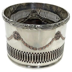English 19th century silver plated champagne bottle coaster