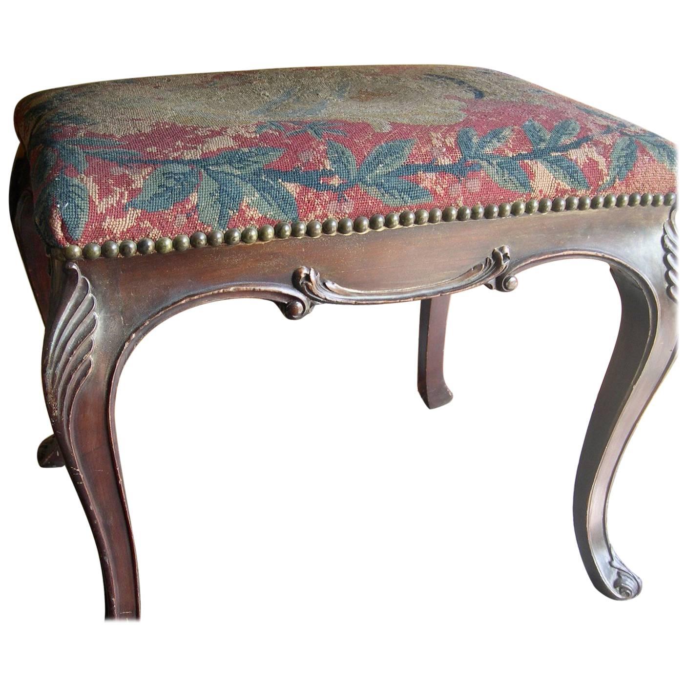 English 19th Century stained hand carved walnut needlepoint bench.
 