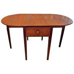 English 19th Century Stained Pine Drop-Leaf Gate-Leg Oval Table with Two Drawers