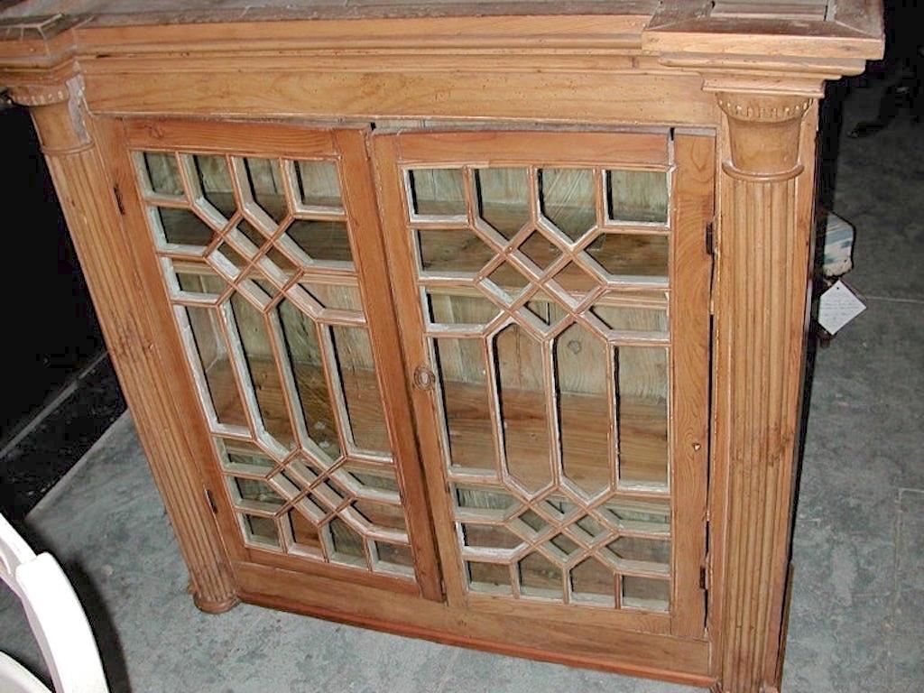 Glass English 19th Century Stained Two Part Pine Bookcase with 4 Doors and 3 Shelves For Sale