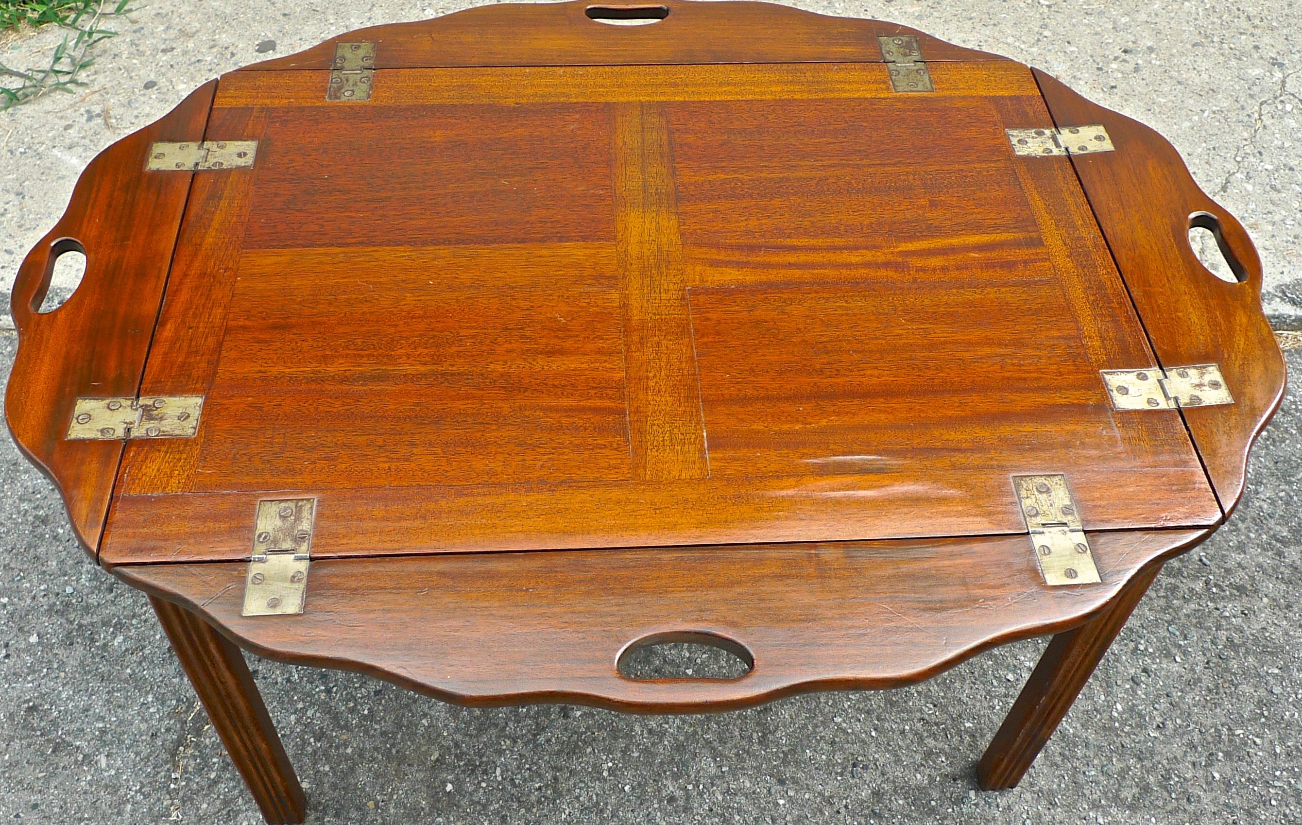 English 19th century stained walnut butler's tray table.