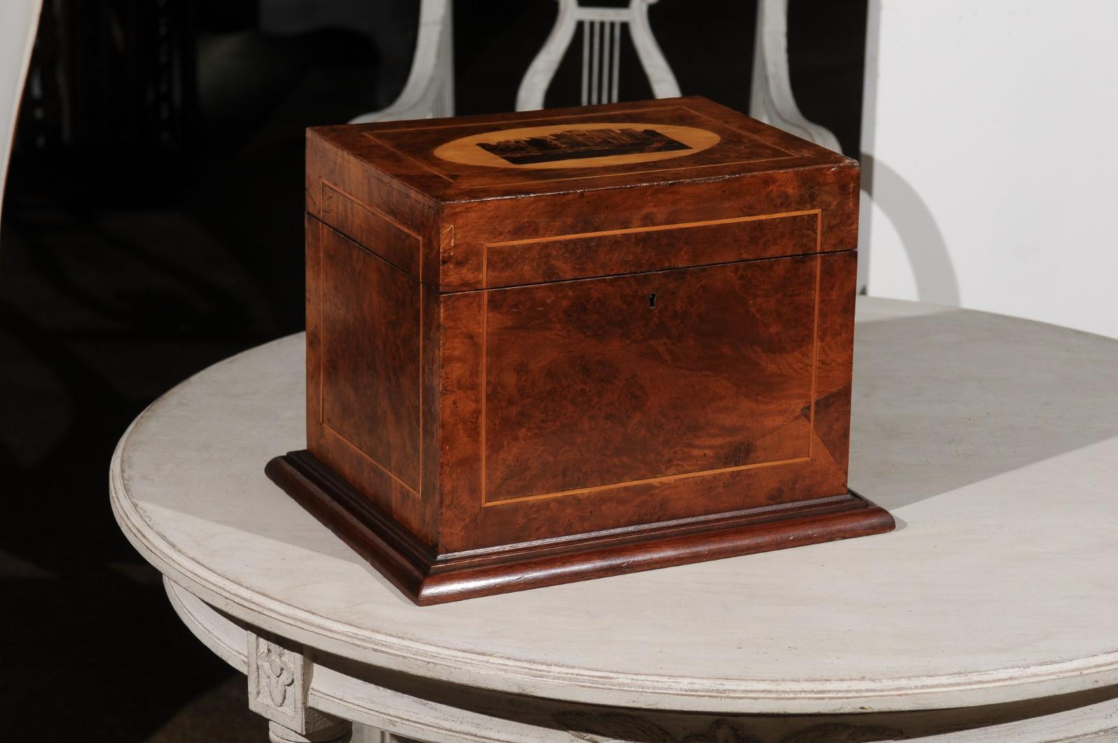 An English Tunbridge Ware dresser top jewelry box from the 19th century, with inlaid medieval castle décor and deep interior storage. This English jewelry box, typical of the Tunbridge ware production famous for its decorative inlaid woodwork,