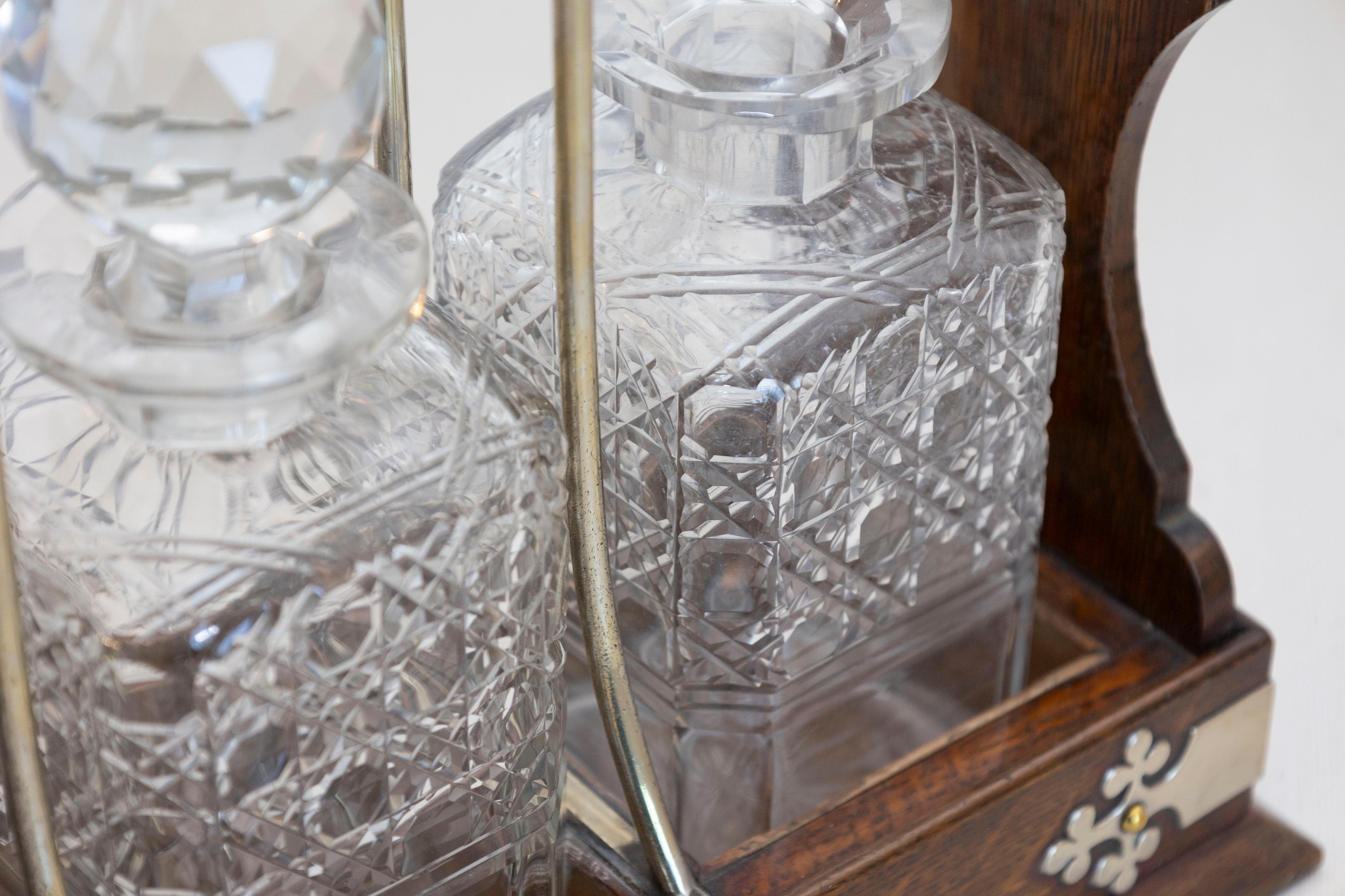 English 19th Century Victorian Locking Tantalus with Three Cut Glass Decanters For Sale 10