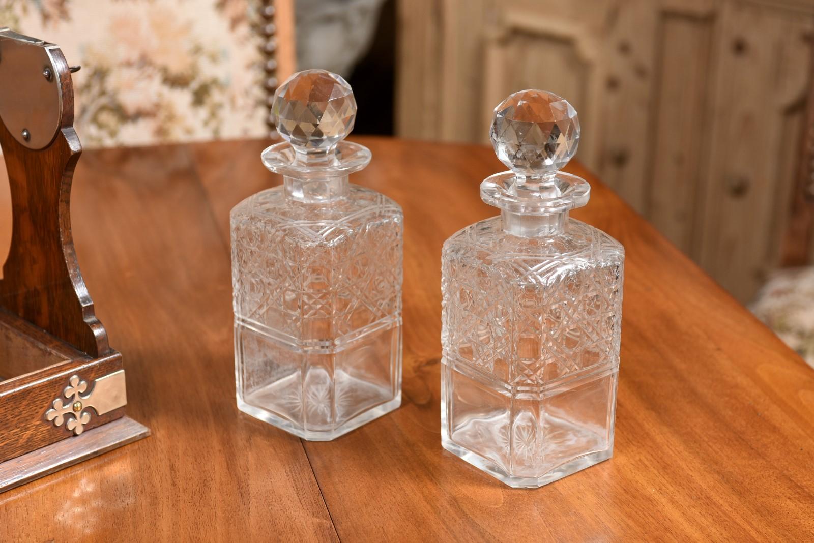 Silvered English 19th Century Victorian Locking Tantalus with Three Cut Glass Decanters For Sale