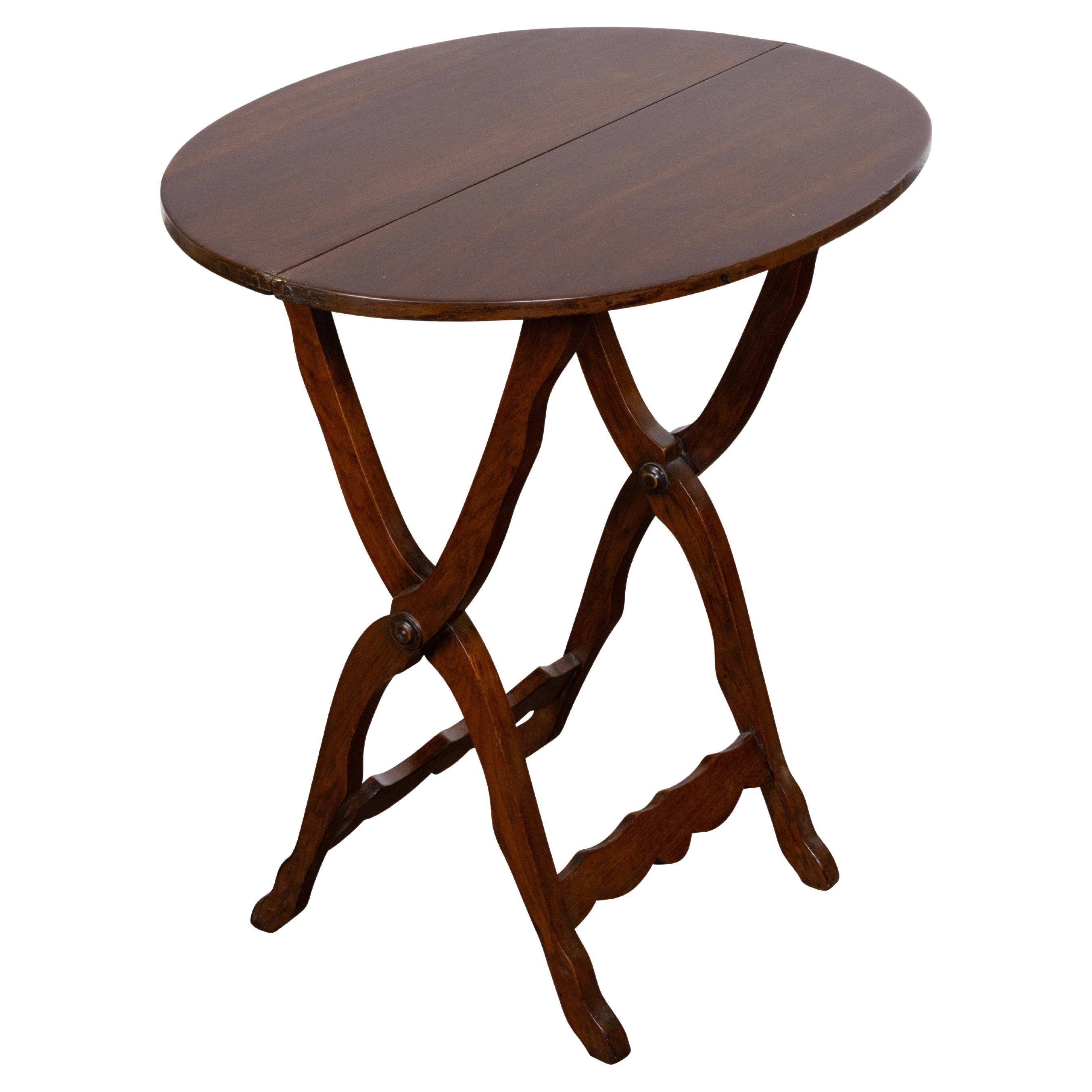 English 19th Century Walnut Oval Folding Side Table with X-Form Base For Sale