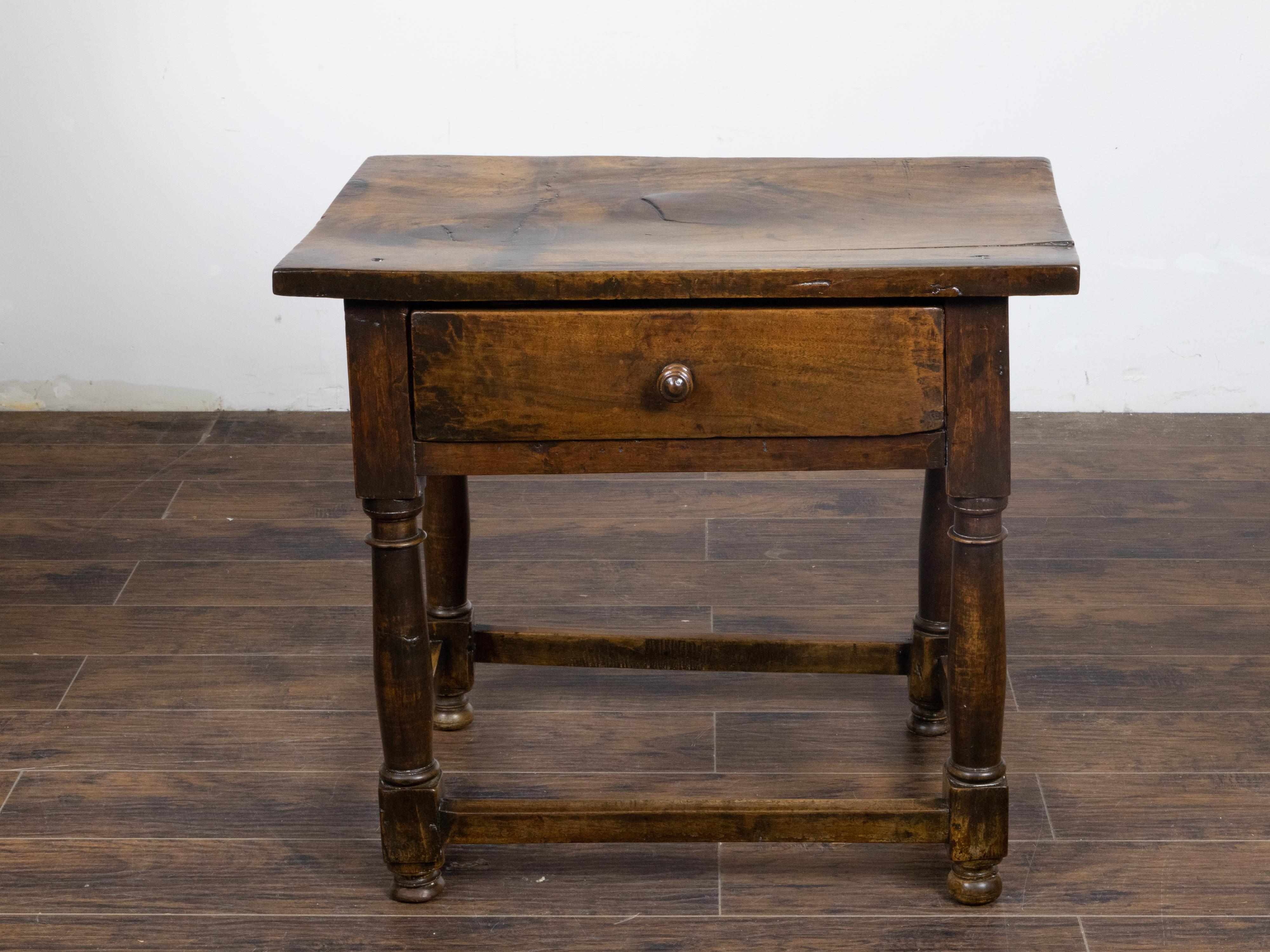 Carved English 19th Century Walnut Table with Single Drawer and Column Shaped Legs For Sale