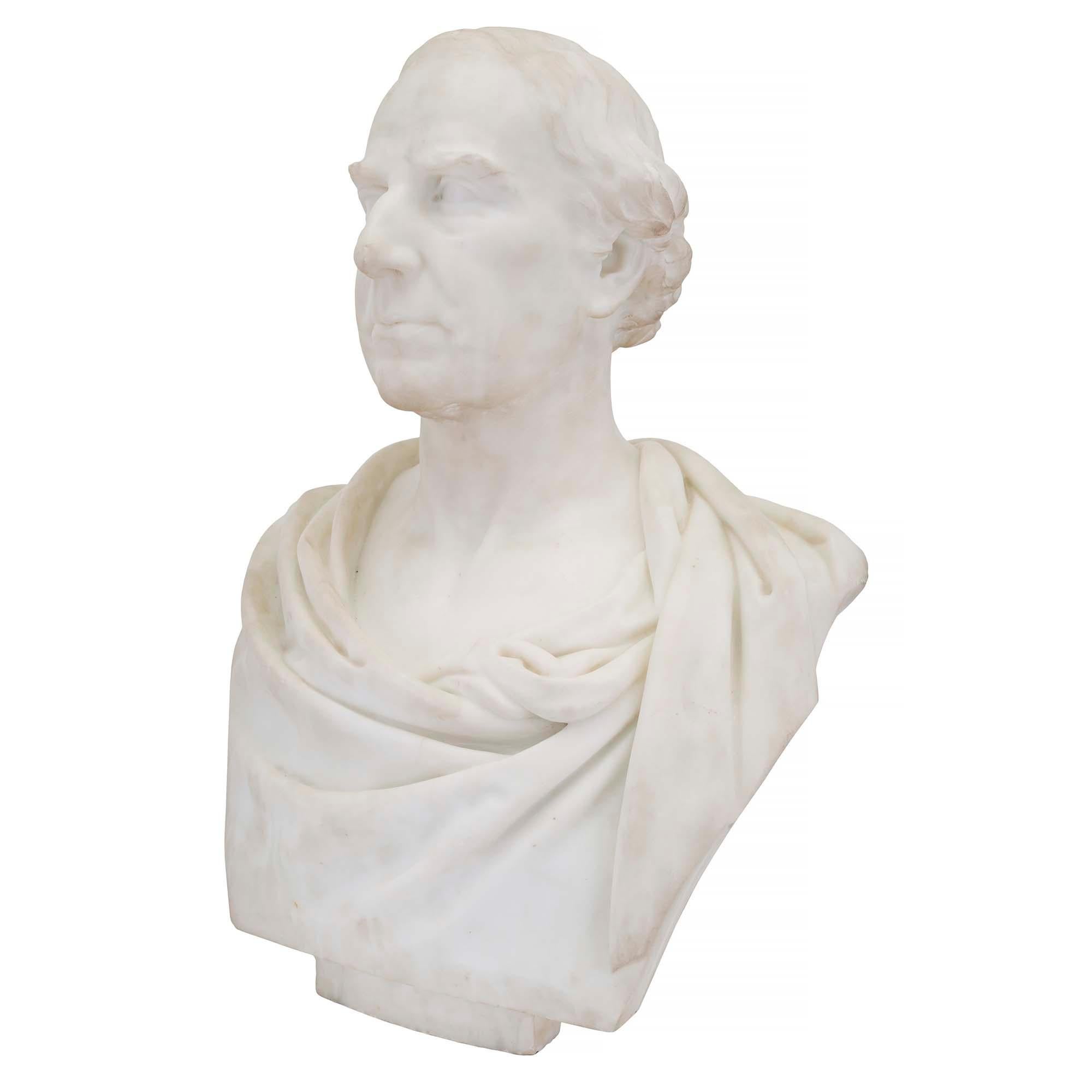 A detailed and wonderfully executed English 19th century white Carrara marble bust of a classical nobleman by famous English sculptor Sir William Hamo Thornycroft. The noble with an expression of confidence and authority is clothed in a classic