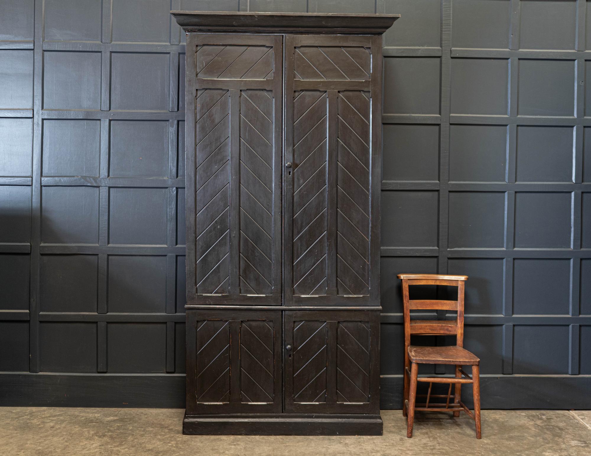 English 19th century ebonized tall church bible cupboard
circa 1880.

Church bible cupboard with herringbone pattern panelled doors.

Sourced from a church in York.

A great versatile piece with a narrow depth that could be ideal for a
