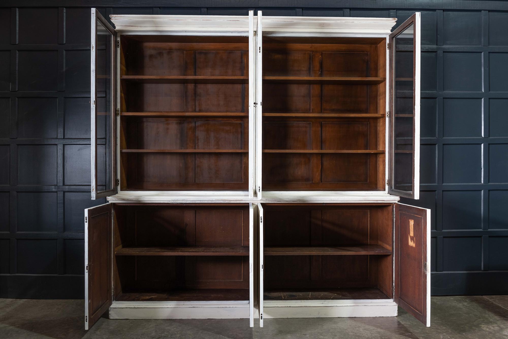 English 19th century large oak painted glazed bookcase,
circa 1870.

Adjustable shelves with solid brass adjusters, door locks with locking key and original brass catches. Three sections, cornice, glazed cabinet and base.

Great scale and
