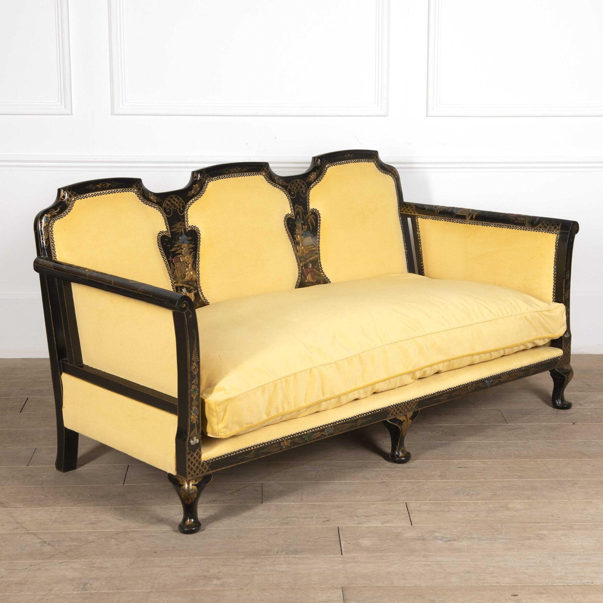 Fabulous 20th century English country house chinoiserie sofa.
This sofa is in the Chinoiserie style but is of English origin. The frame has been beautifully painted and ebonised to represent intricate Chinese designs that depict recognisable