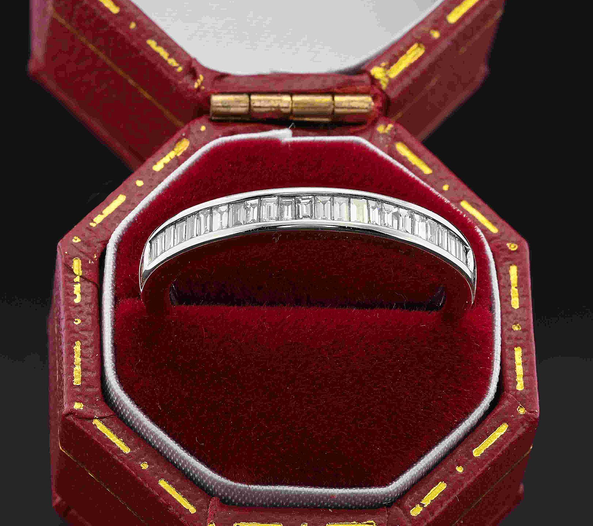 This extra fine traditional half eternity ring is English origin boasting excellent workmanship in a classic vision, made of solid Platinum fully hallmarked for London 2023 Platinum
A magic circle facing up with an array of baguette cut Diamonds,