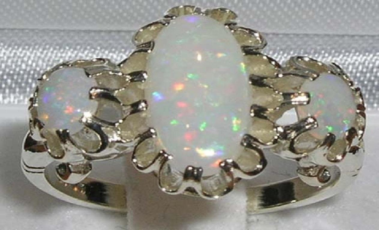 For Sale:  English 9K White Gold Large Elongated Colourful Opal Trilogy Ring 2