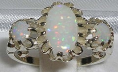 English 9K White Gold Large Elongated Colourful Opal Trilogy Ring