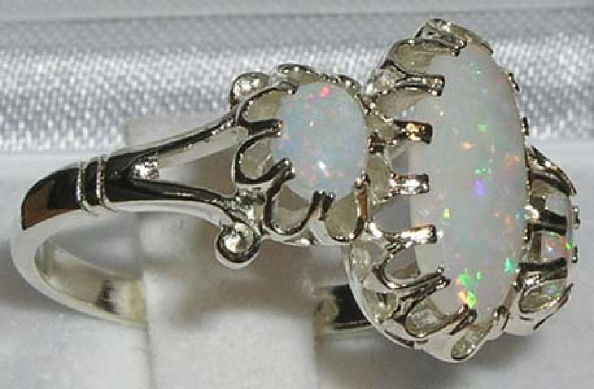 For Sale:  English 9K White Gold Large Elongated Colourful Opal Trilogy Ring 3