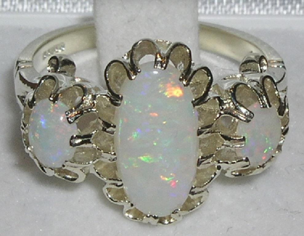 For Sale:  English 9K White Gold Large Elongated Colourful Opal Trilogy Ring 4