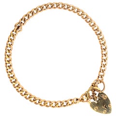 Bracelet anglais à breloques en or rose 9 carats:: Birmingham:: 1970