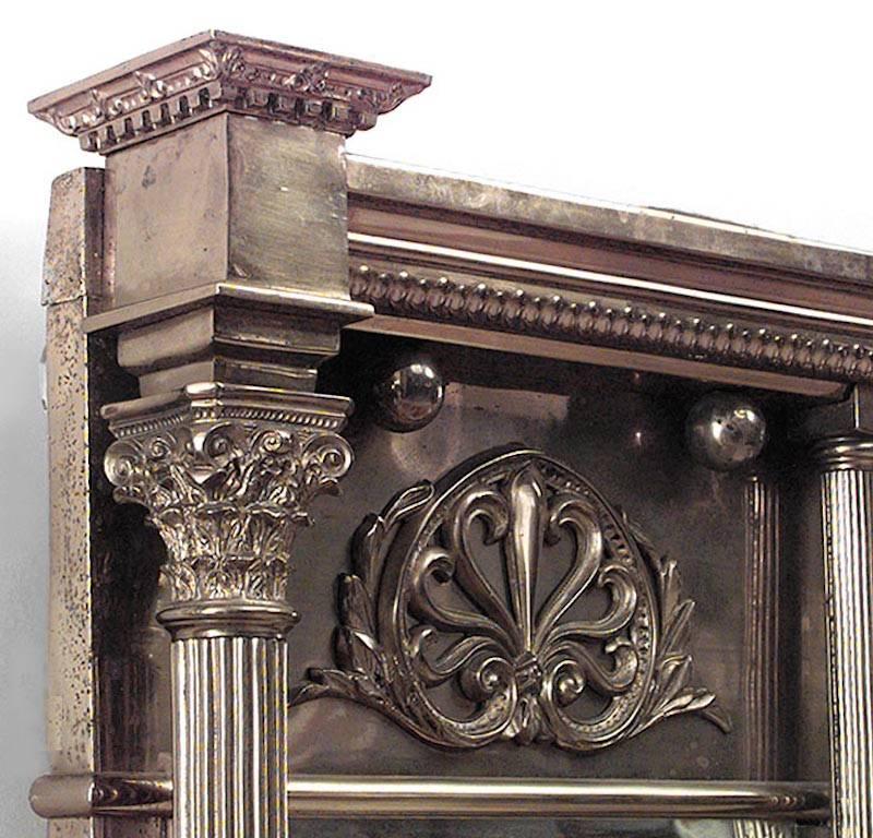 English Adam style (19th century) brass horizontal three-panel wall mirror with column design.
 