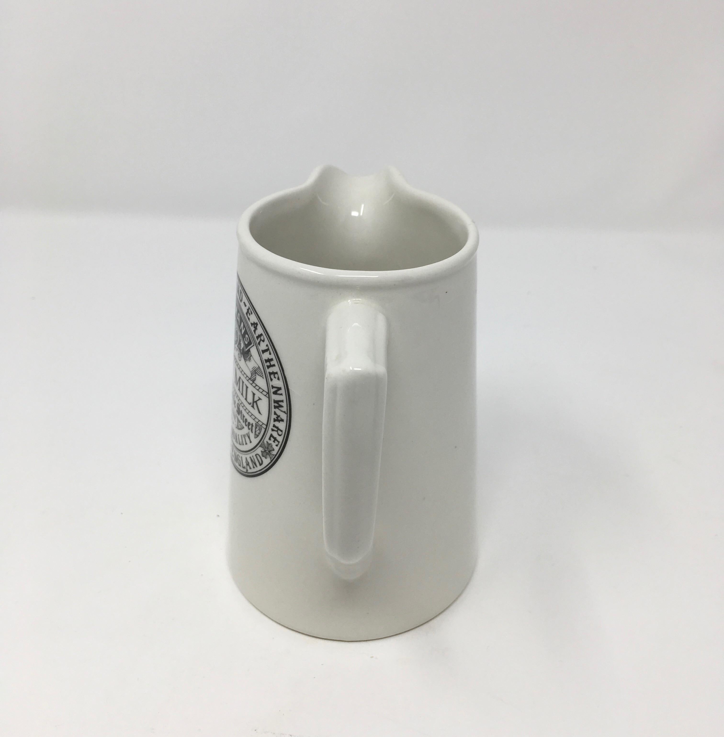 This is an English advertising pottery pitcher. The pitcher has a maker embossed mark on the bottom which reads Sadler England. James Sadler and Sons was a pottery manufacturer founded in 1882 by James Sadler in Burslem, Stoke-on-Trent, United