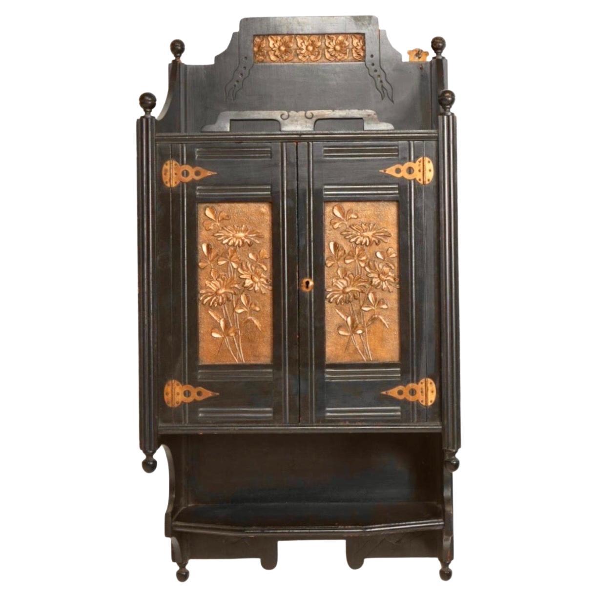 English Aesthetic Ebonized Wood and Brass Wall Cabinet For Sale