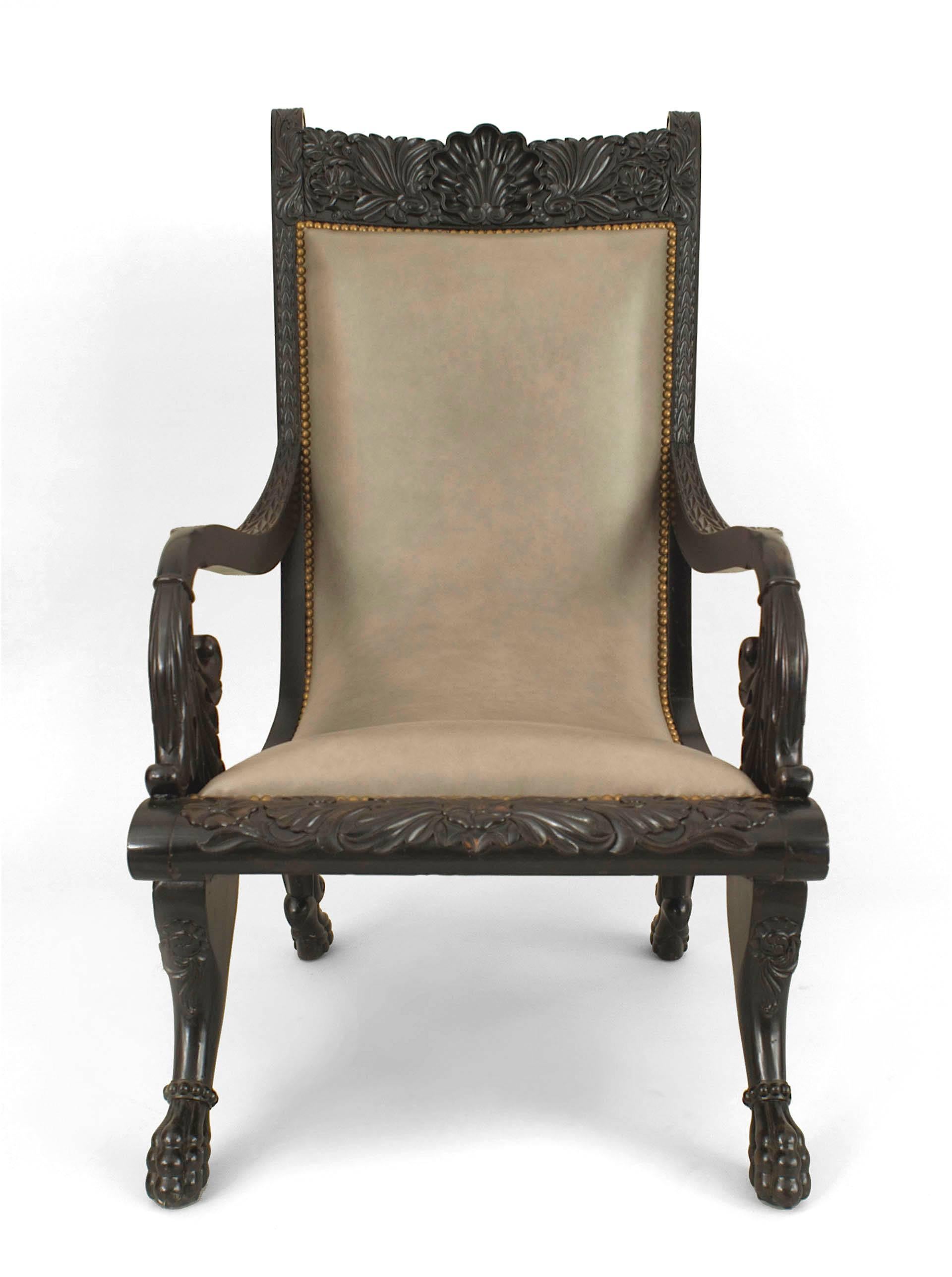 English Anglo-Indian (19th Century) ebony carved open armchair with a gray leather upholstered seat and back with nail heads.
