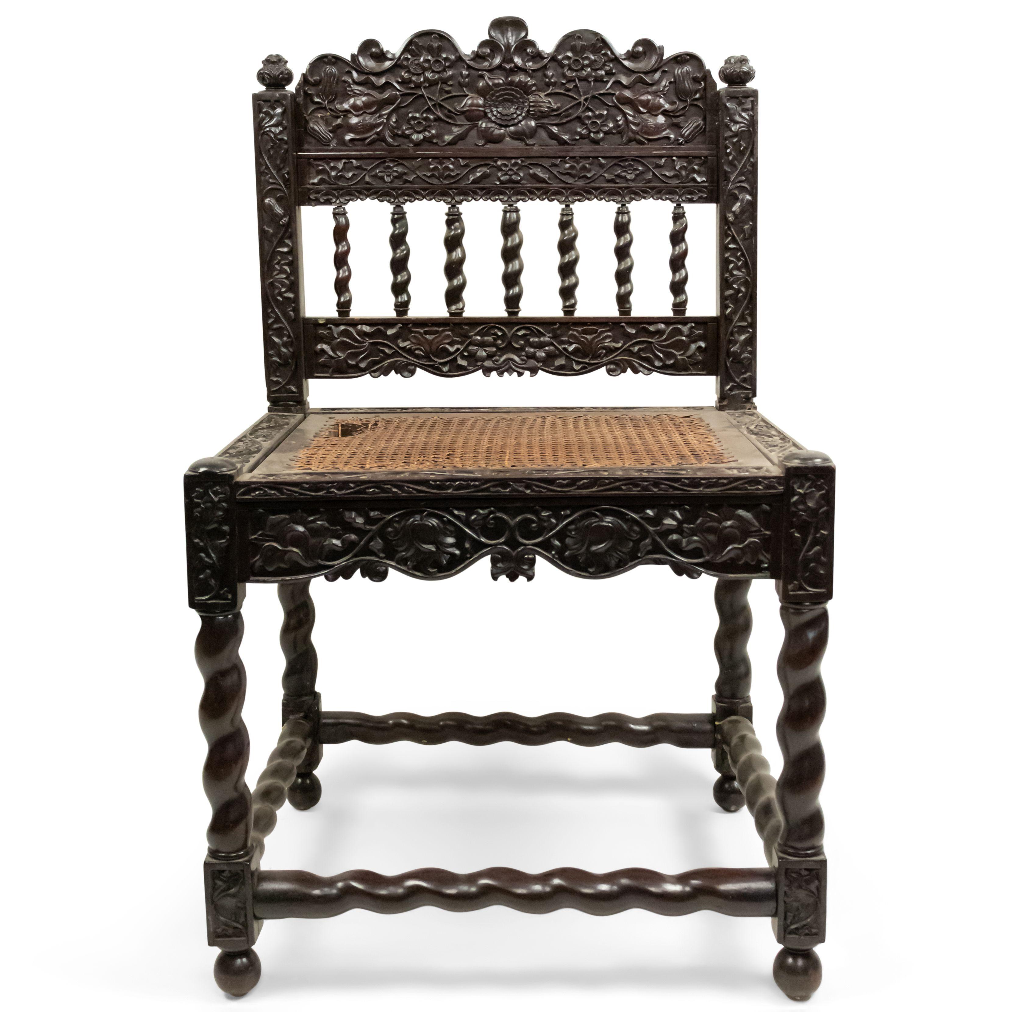 Set of 4 19th century English Anglo-Indian rosewood carved side chairs with cane seat panel and swirl design legs and stretcher with open design spindles on back.