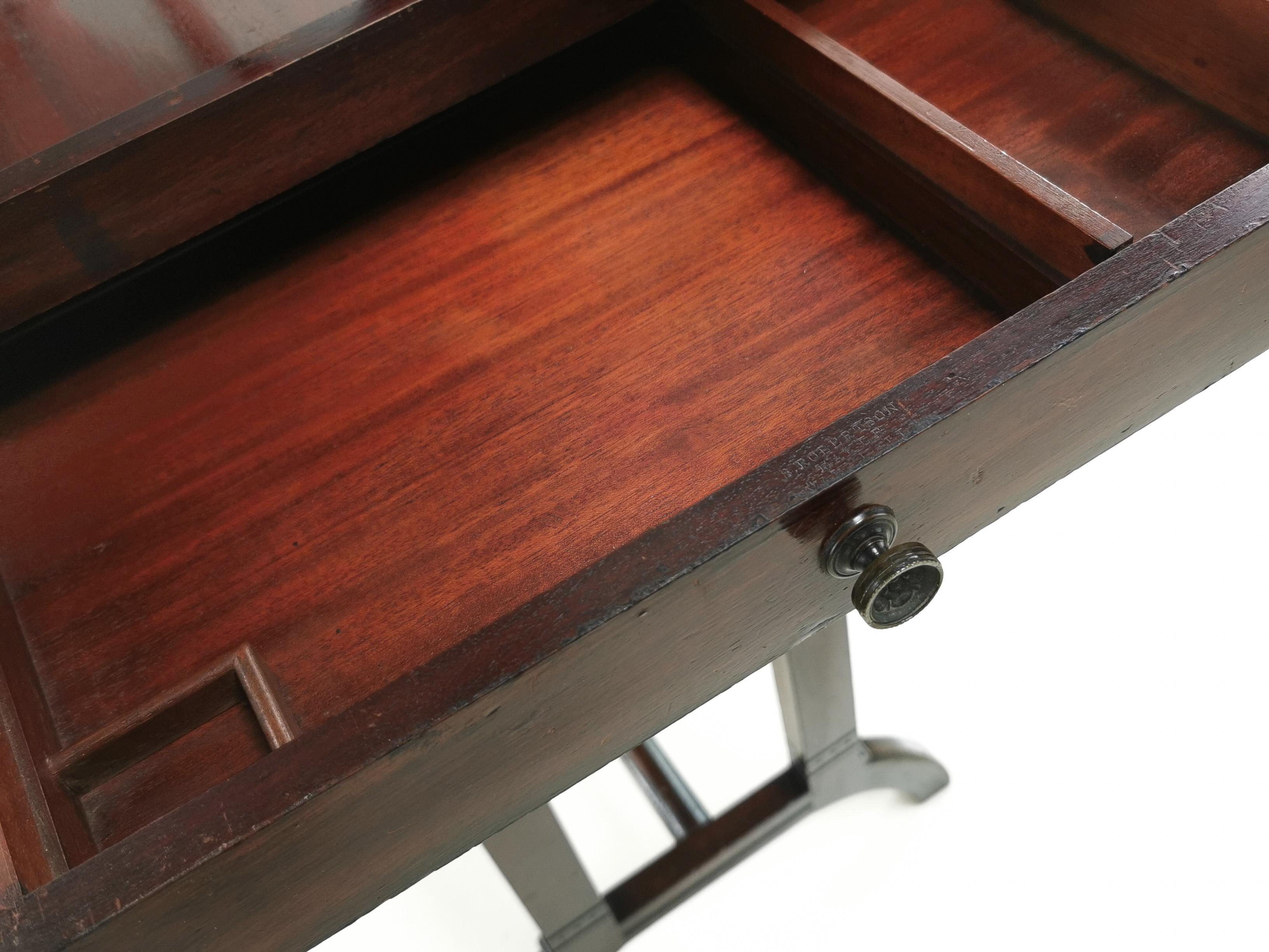 Edwardian architects table

A mahogany architects table with a single sectioned drawer. 

Featuring a rise and fall adjustable top. 

Stamped by the cabinet maker 