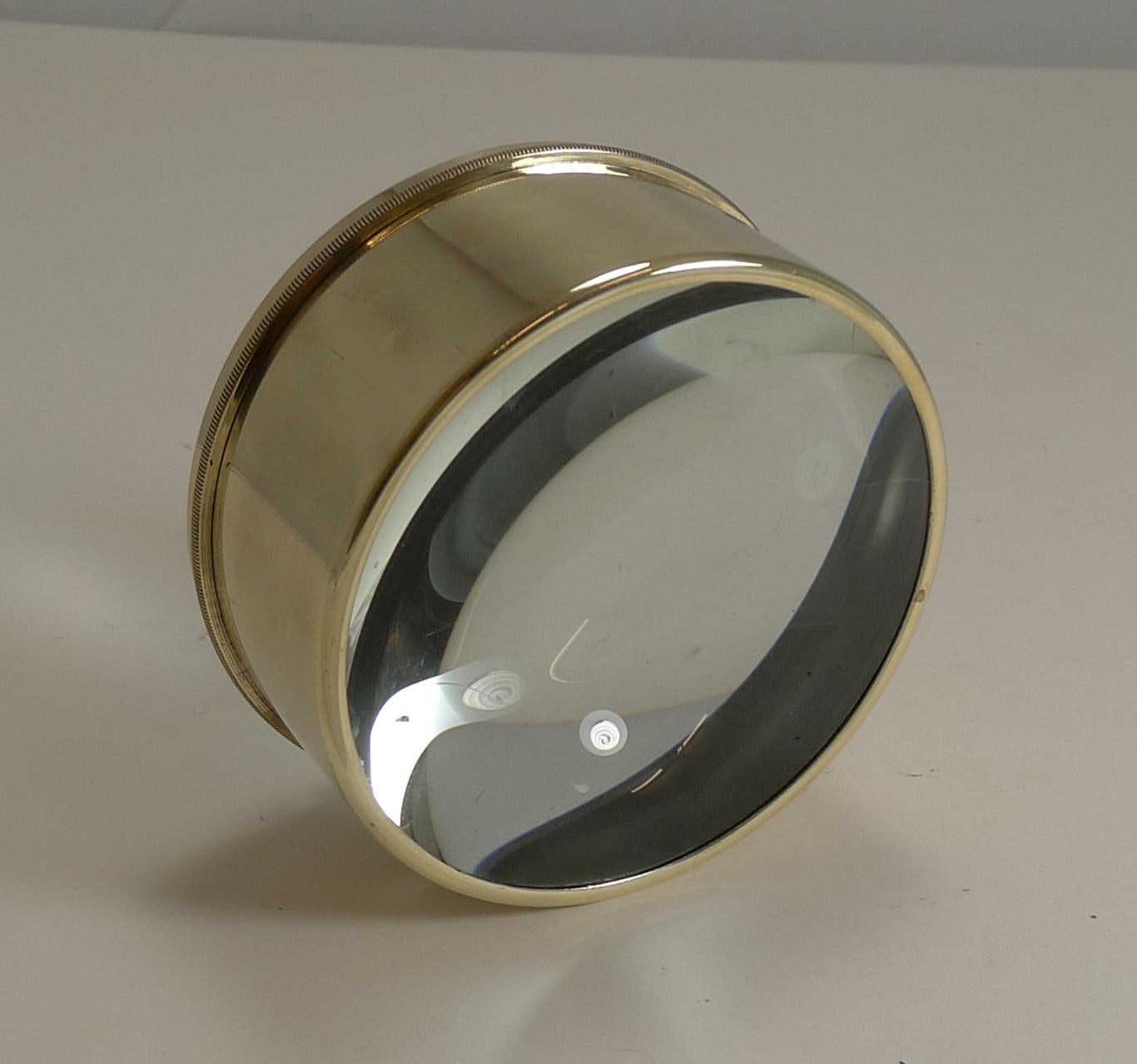 Always very popular and a very useful desk-top accessory. These large circular magnifiers actually are the condenser or magnifier from a Magic Lantern dating to circa 1910; they are rescued, polished up and put back to use in the modern day.

This