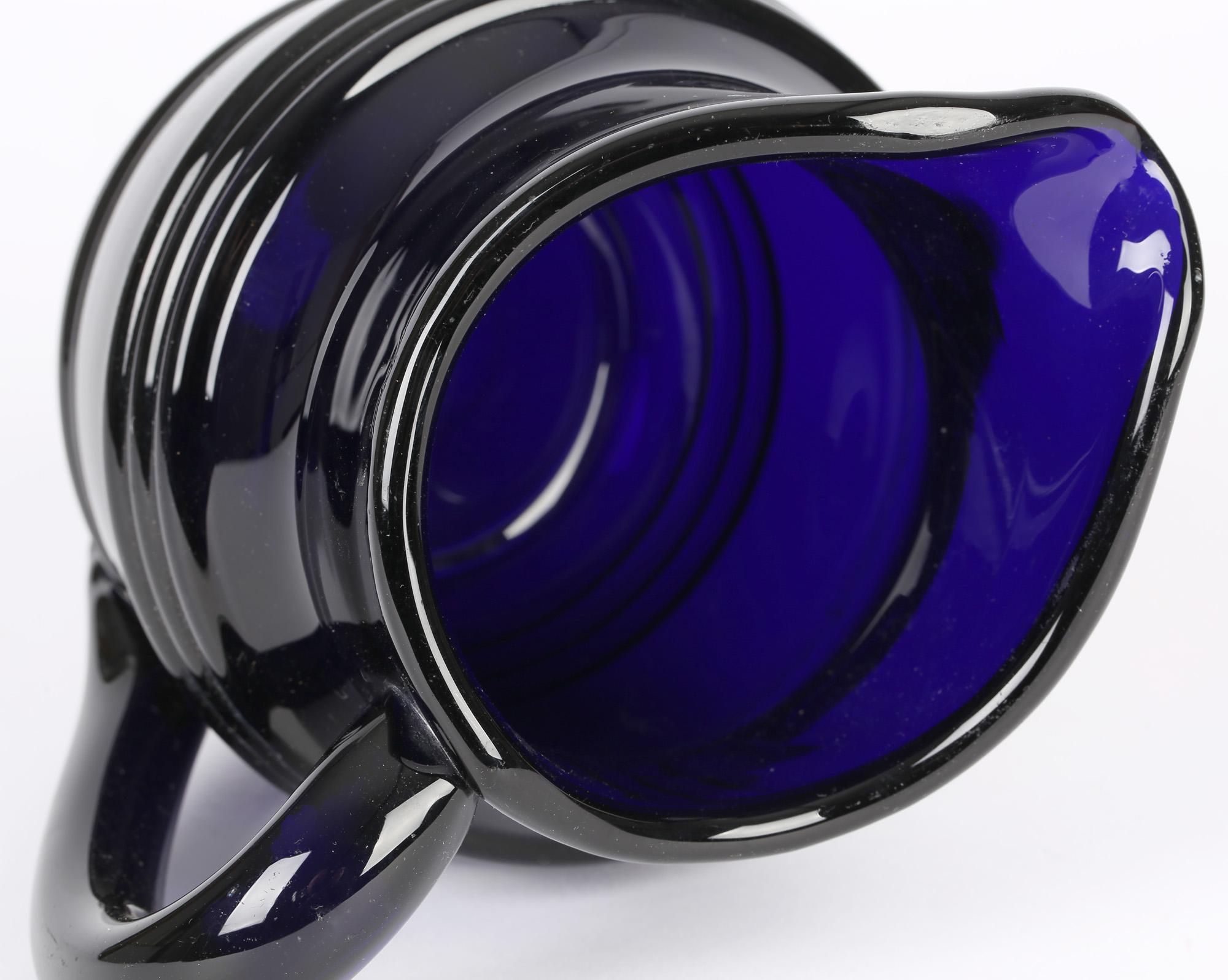 blue glass water pitcher
