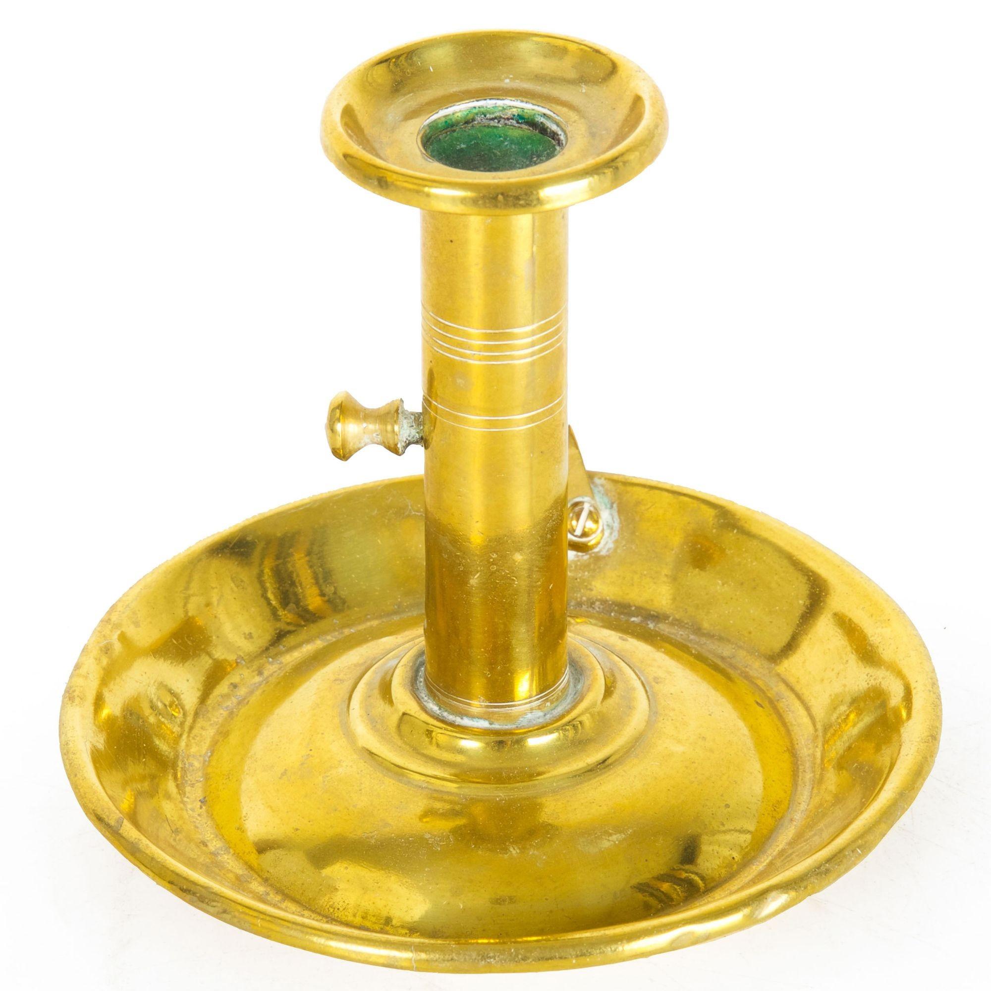 English Antique Georgian Brass Candlestick Chamberstick, 19th Century
Item #  104OCJ23L-4

A good early 19th century brass chamberstick, the baluster is beautifully turned with incised ring decorations around the stem while a single knob in the