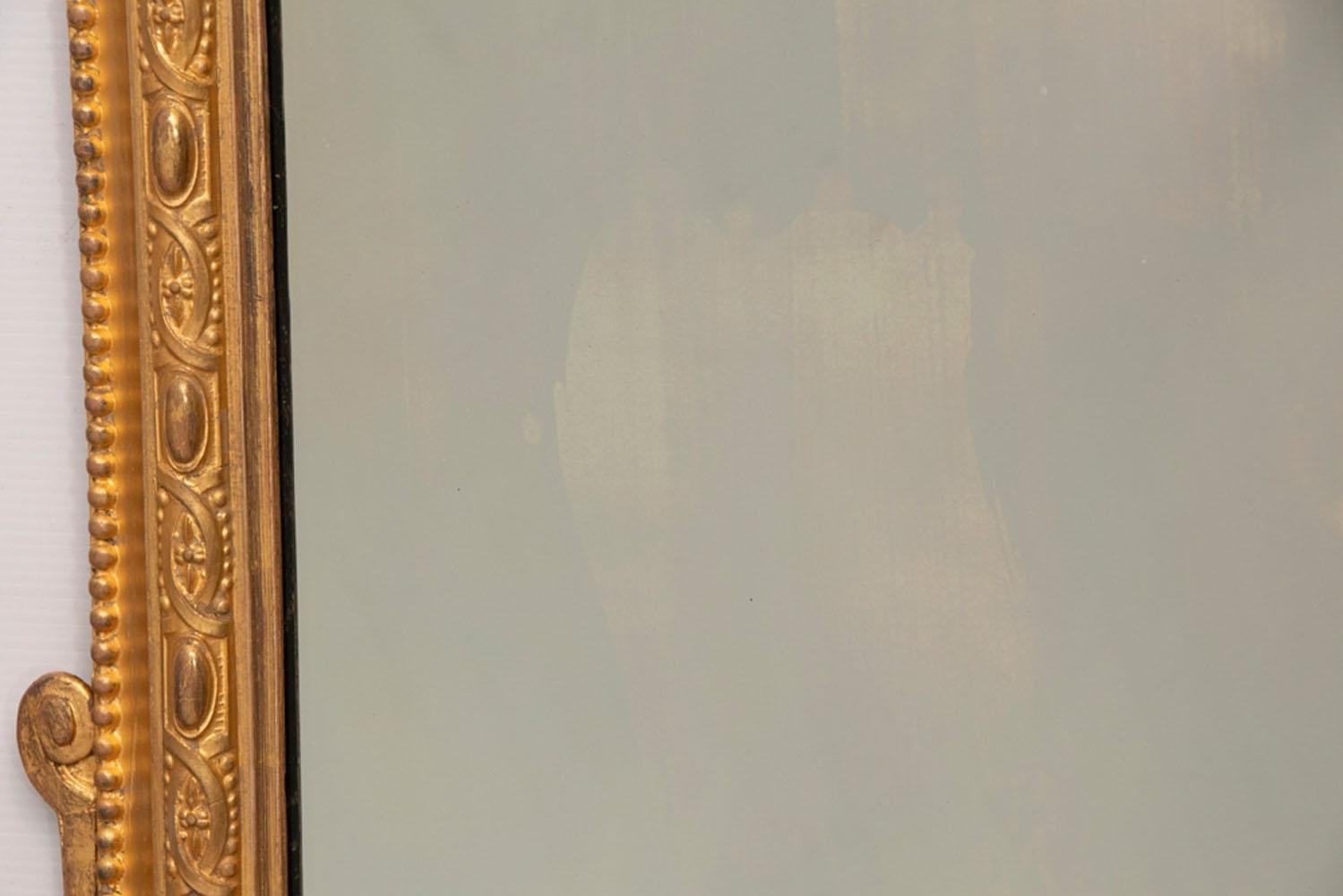 English antique giltwood overmantle mirror, circa 1890. Sizes 115cm high, 111cm max width. Superb quality 23.5-carat genuine gold leaf water gilding. Gilt composition decoration on frame. Original mirror plate. Original backing boards.

  