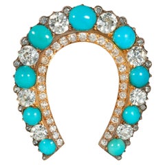 English Antique Gold, Cabochon Turquoise, and Old Cut Diamond Horseshoe Brooch