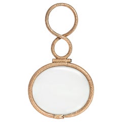 Pendentif en verre doré ancien à motif de serpent
