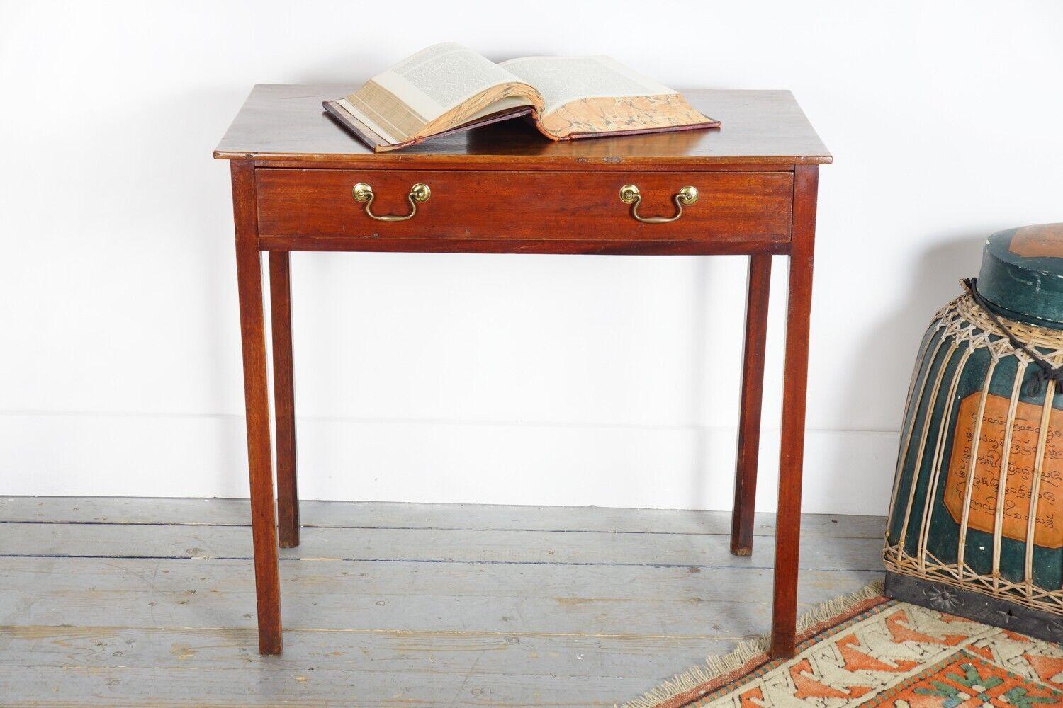 Antique Side Table

An early 19th century English compact side table or writing desk.

Oak side table with single drawer with two brass swan neck handles.

Dimensions (cm): 

75 H x 80 W x 43 D 