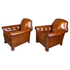 English Antique pair of Victorian leather club chairs 