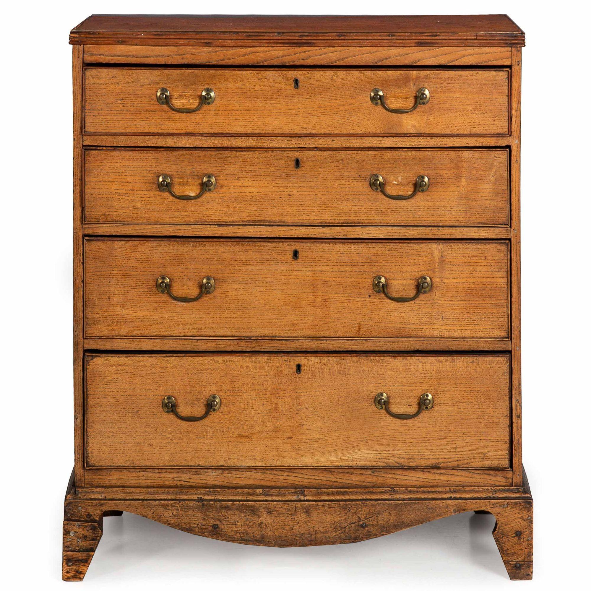 ENGLISH PATINATED ELM CHEST OF FOUR DRAWERS
Raised on bracket feet; circa first quarter of the 19th century
Item # 402ZPB08Q

This gorgeous heavily worn and patinated elm chest of drawers features a rich sunbleached surface throughout that is made