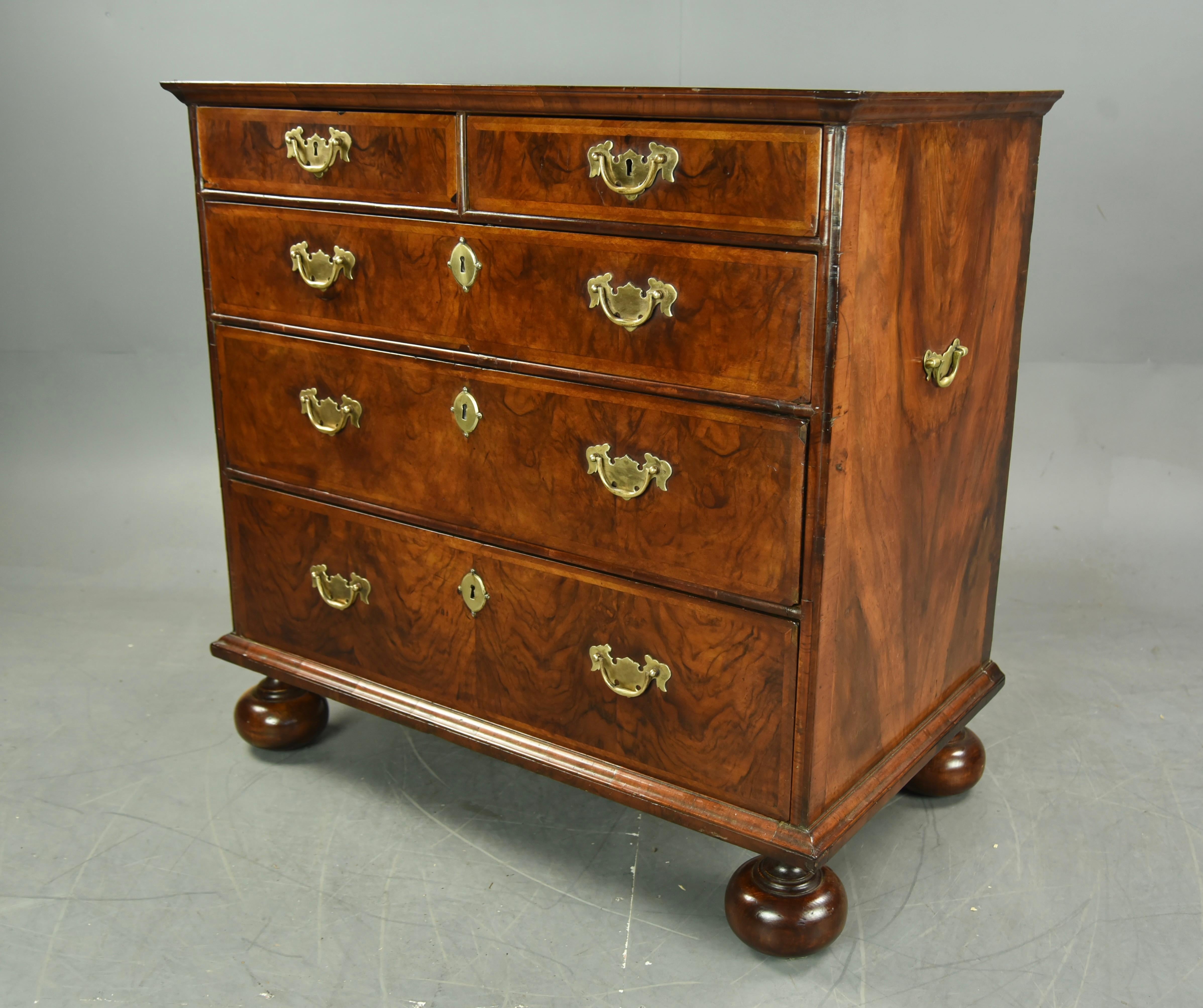 superb Queen Anne walnut chest of drawers circa 1720 .
The chest has a wonderful colour and grain and a great antique patina .
The oak lined drawers are all sound and slide nice and smooth as they should .
A very decorative chest of drawers that
