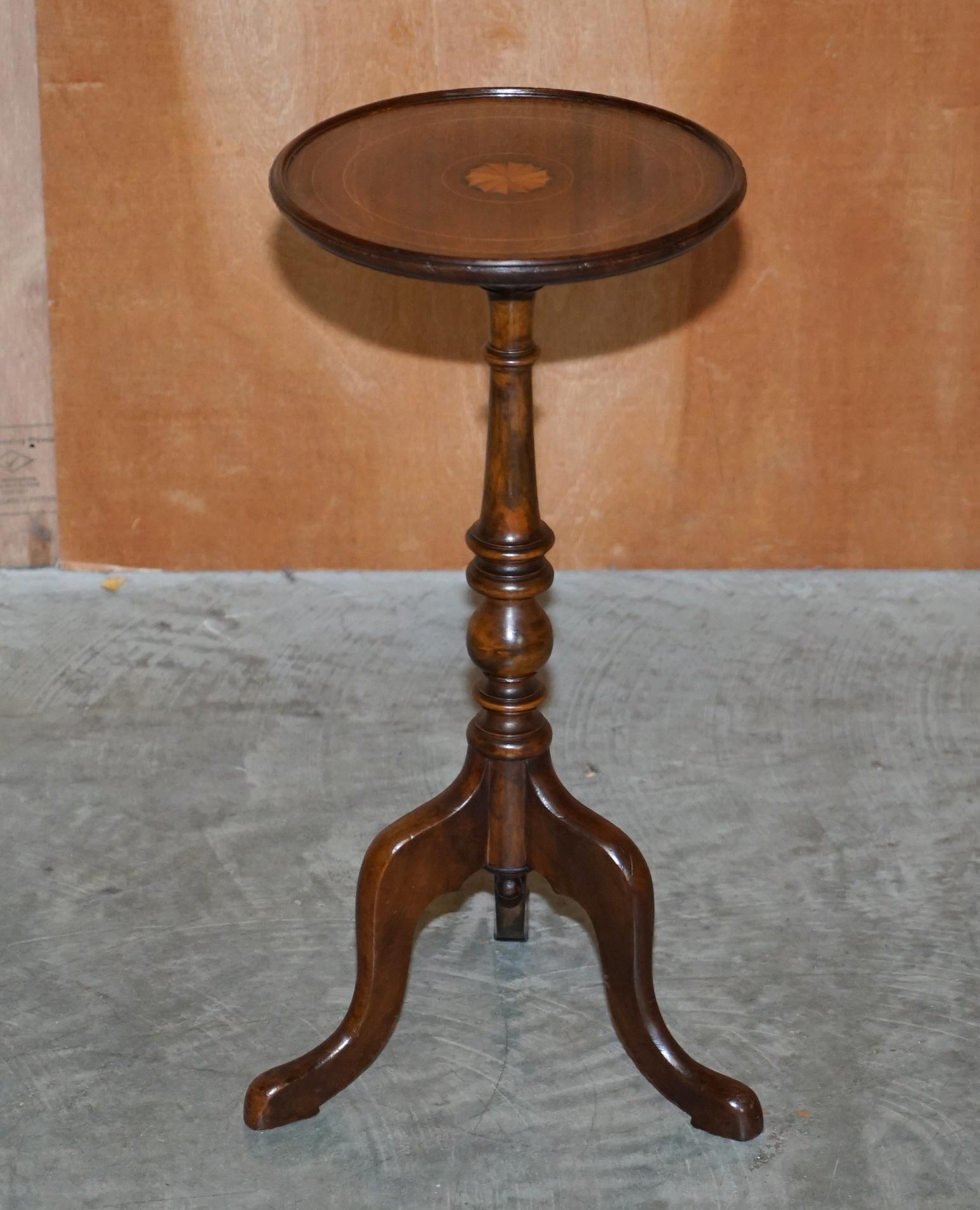 We are delighted to offer for sale this lovely Sheraton Revival tripod table 

A very good looking well made and decorative piece, it sits well in any setting and is very unitarian. The piece has the Sheraton revival inlay to the top, its vintage,