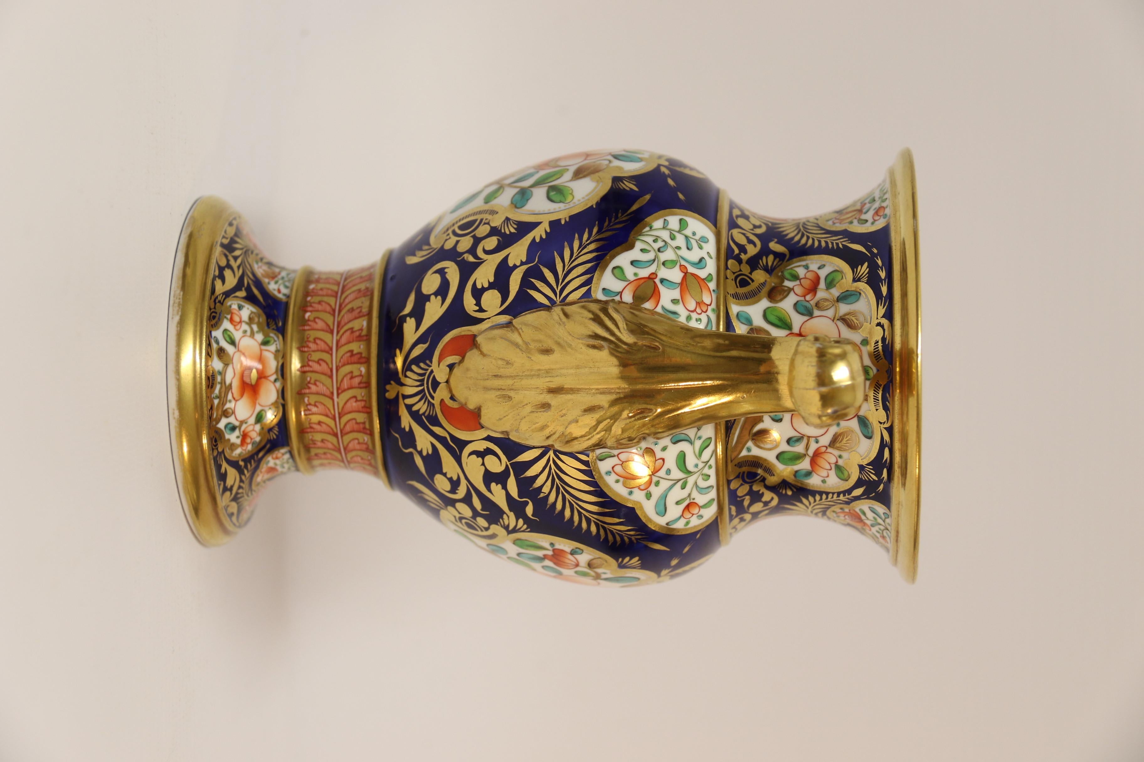 This rare and wonderful quality, richly decorated early 19th century English Spode porcelain twin handled vase is finely hand painted in an Imari style floral design with rich high fired gilding.
The condition is perfect with no damage or