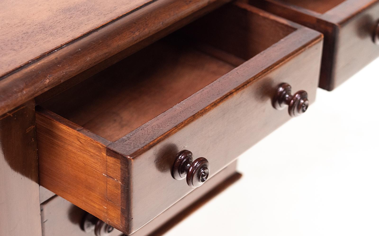 Victorian desk

Offered a British late Victorian mahogany writing desk, beautifully made with turned legs that sit on casters.

It is featuring five drawers to the front with moulded handles.