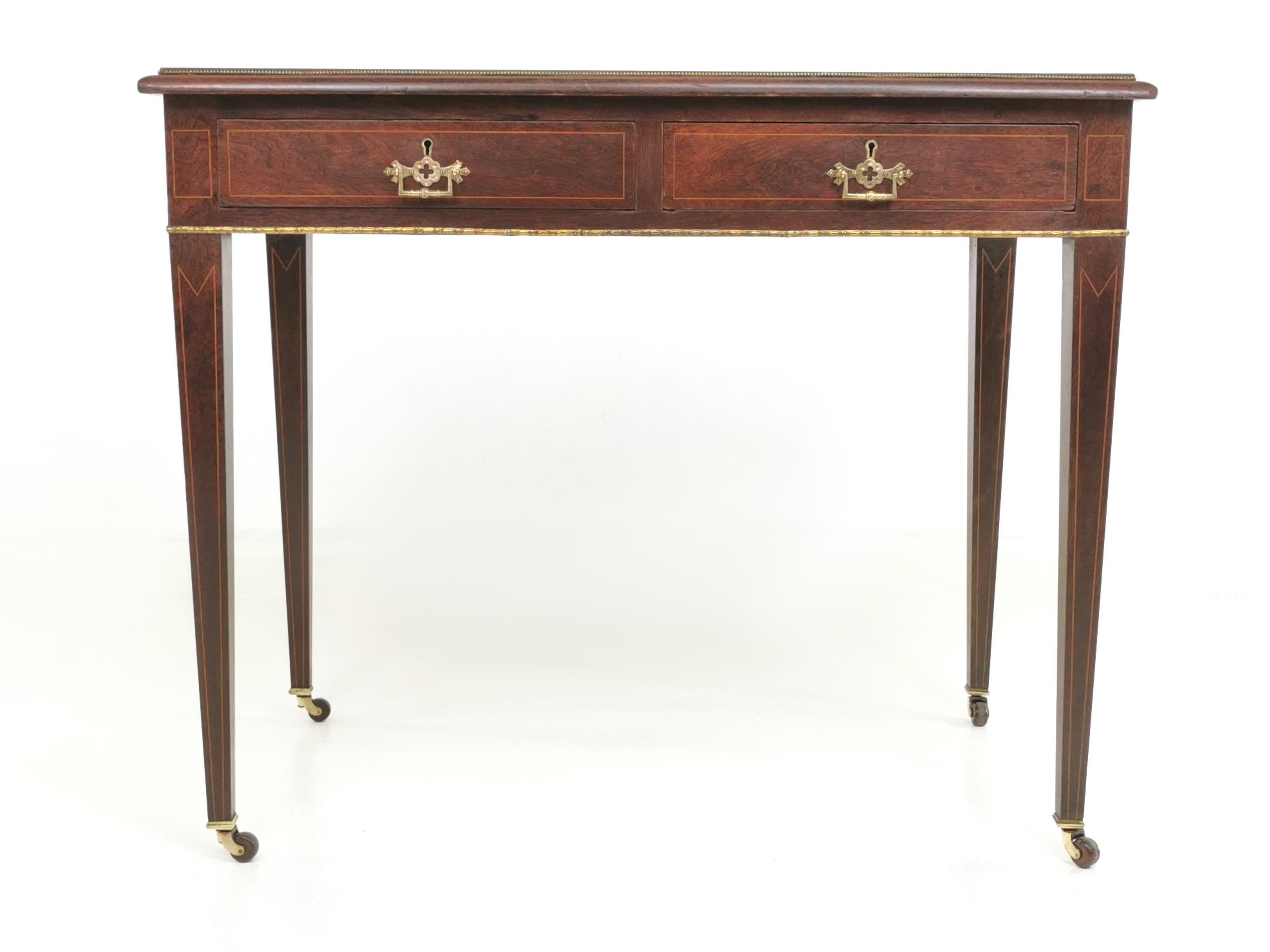 Victorian desk

Victorian mahogany writing desk on castors and with a wonderfully worn tooled leather top. 

Twin drawers fitted with detailed brass pulls. Raised on square tapered supports.

English, circa late 1800s.

Dimensions (cm):?