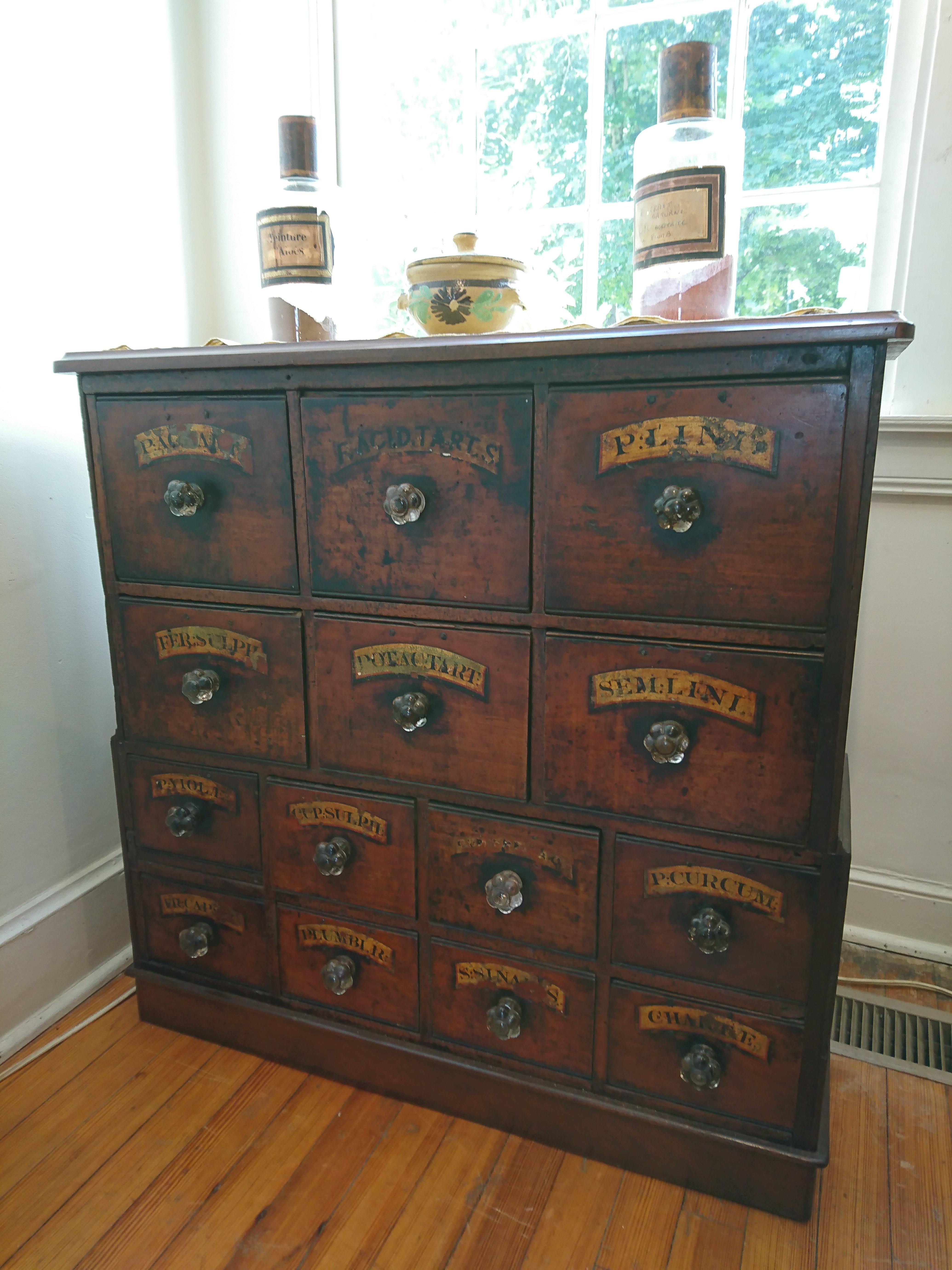 This English Apothecary dates from 1850 and is made of mahogany. Those who know our store are aware of our love of multi drawer pieces. This apothecary is the gold standard: it’s got both original labels and original glass knobs. If a piece could be