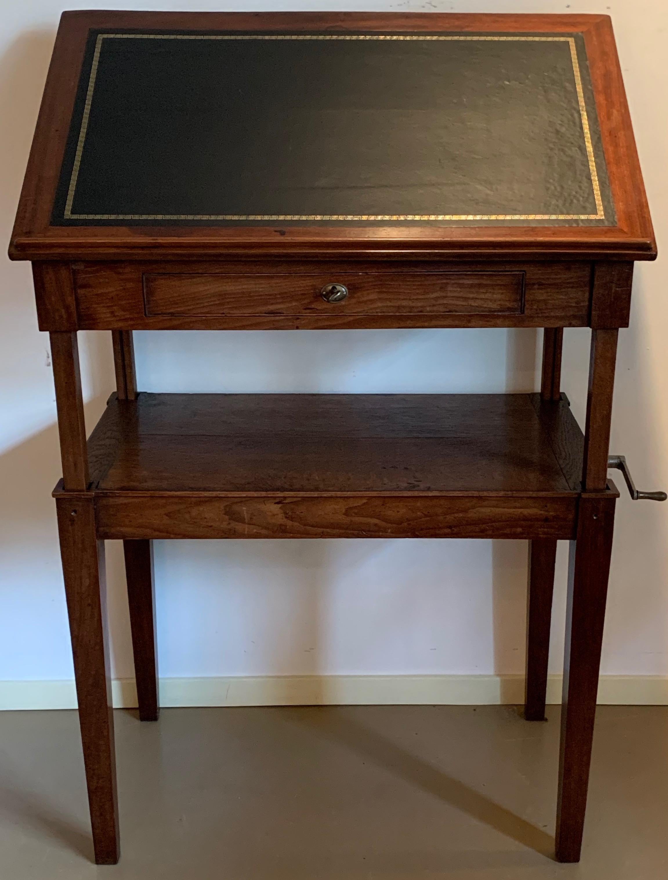 A late 18th century English architect's drawing table / desk of mahogany. The legs and extendable parts of oak. The green leather writing/working surface adjusts to various angles. The table is height adjustable from 67cm to 100cm.

