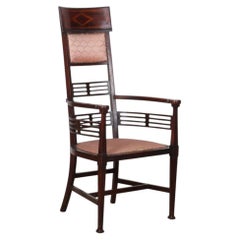 English armchair by J.S. Henry, Arts and Crafts, late 19th century