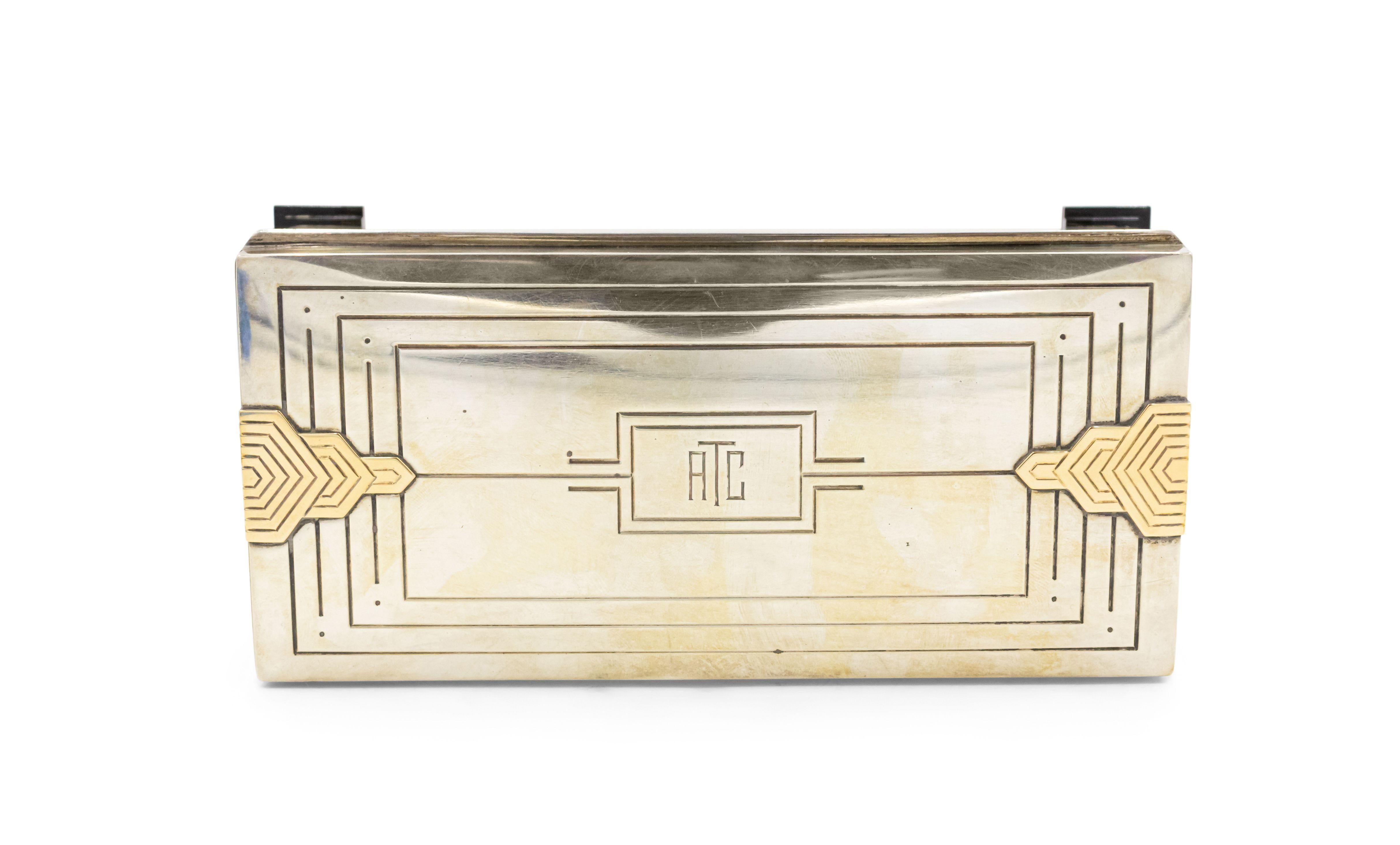 English Art Deco sterling silver rectangular box with fluted design and 14 caret geometric trimmed design on sides with initials: ATC on top.
