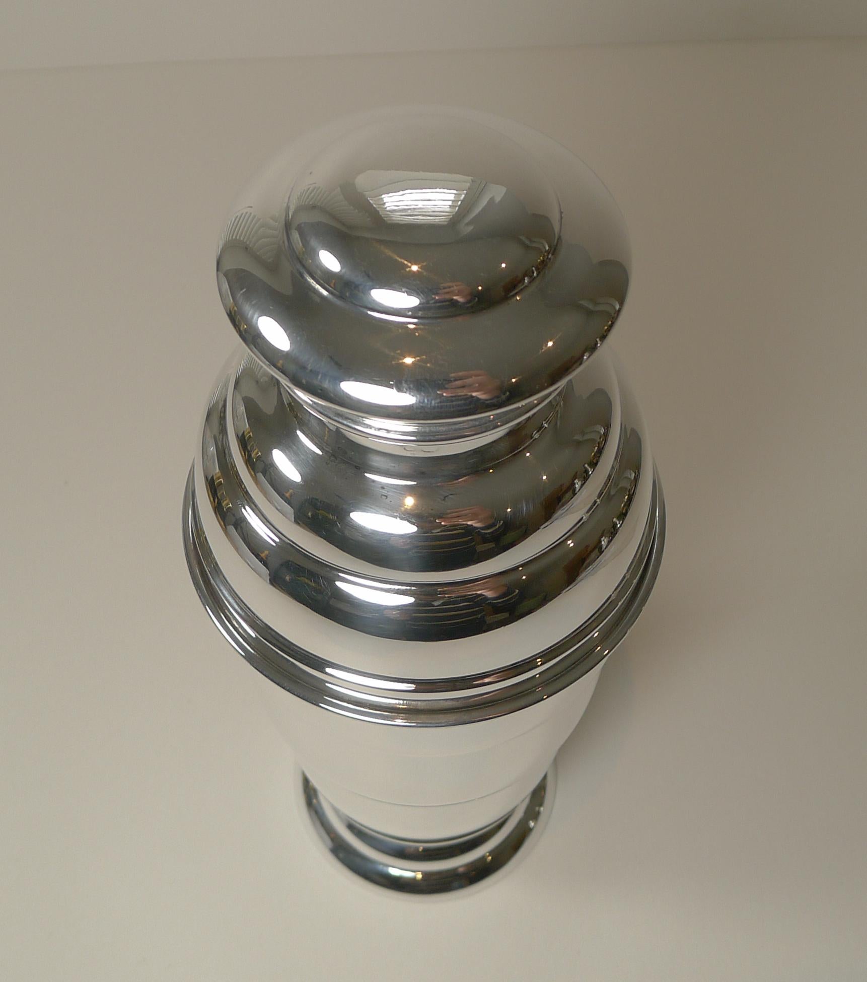 A truly fabulous English Art Deco silver plated cocktail shaker, beautifully shaped and in lovely condition having just returned from our silversmith's workshop where it has been professionally cleaned and polished, restoring it to it's former