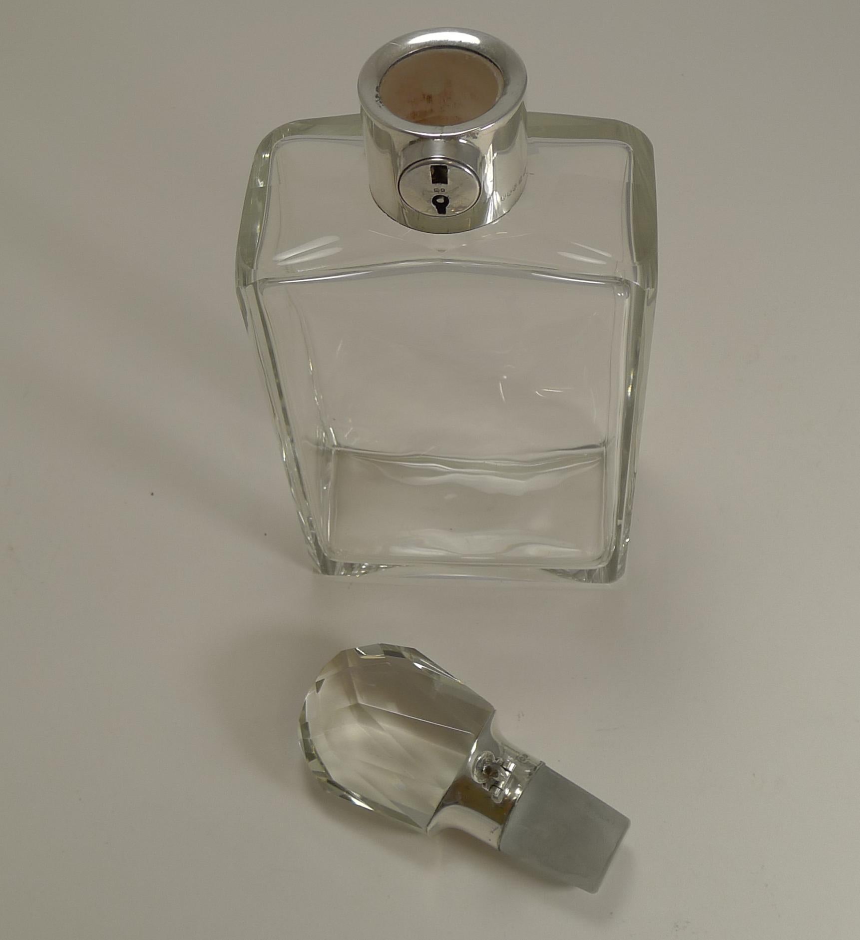 Mid-20th Century English Art Deco Crystal and Sterling Silver Locking Decanter by Hukin and Heath For Sale