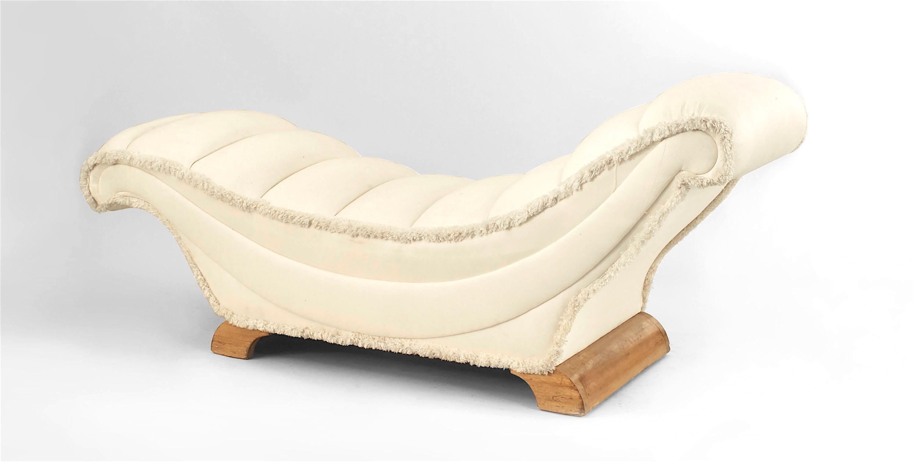 English Art Deco maple recamier of sleigh form upholstered in white cotton with fringed edge (Attributed to BETTY JOEL)
