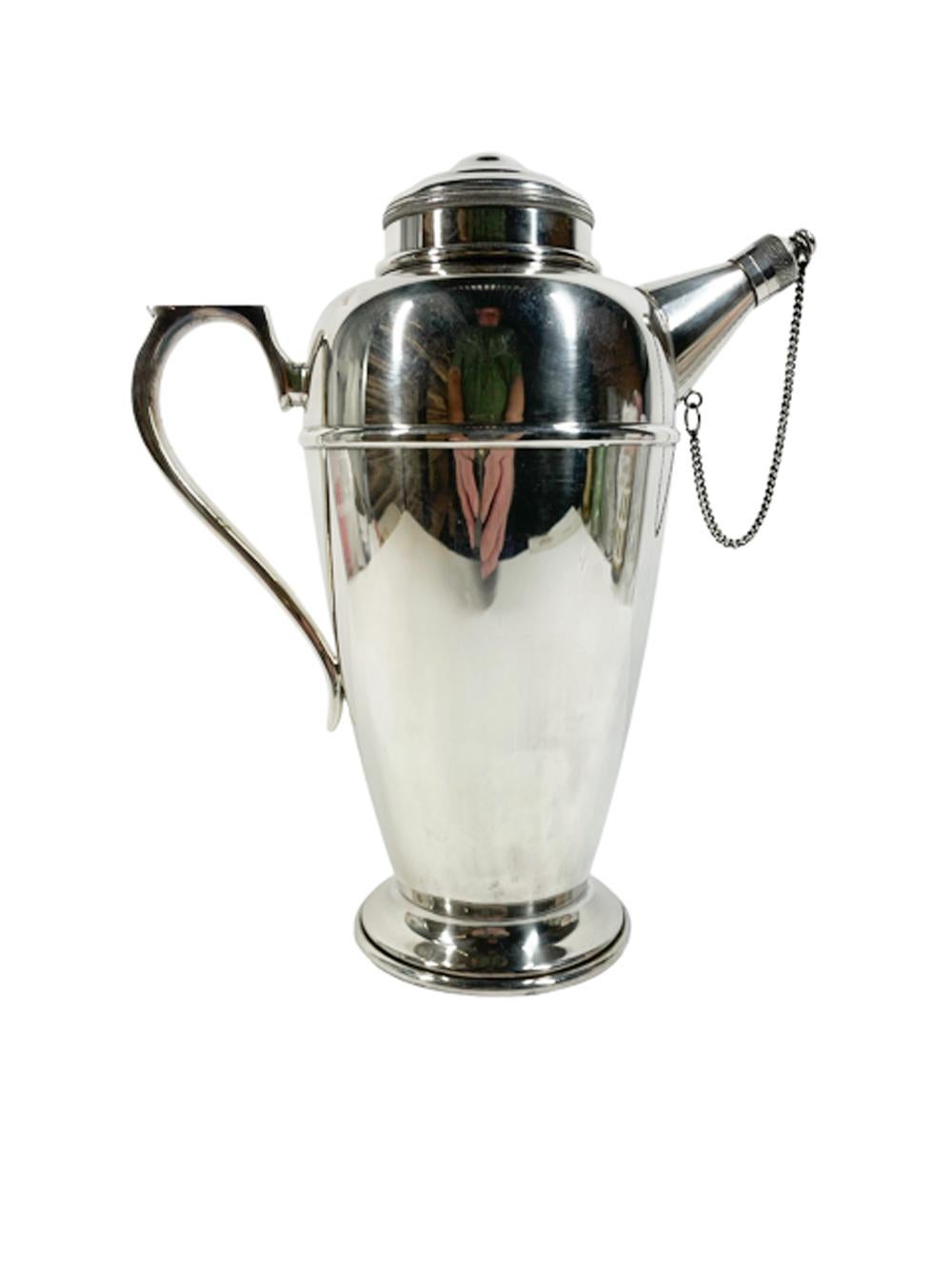 Art Deco silver plate cocktail shaker of tapered bulbous form with a scrolled handle and tapered spout with screw cap attached by chain, marked 