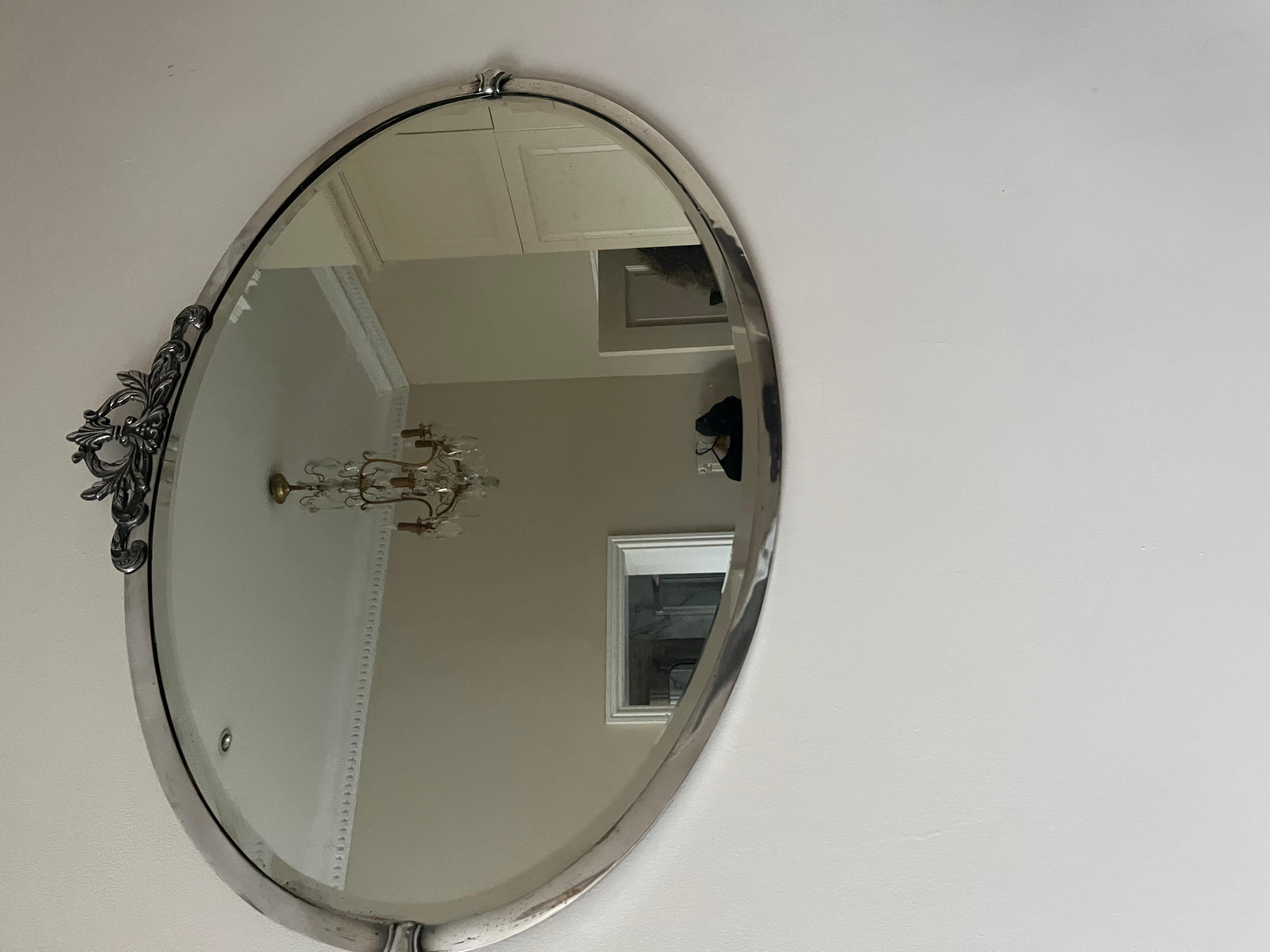 Early 20th Century English Art Deco silverplate oval mirror