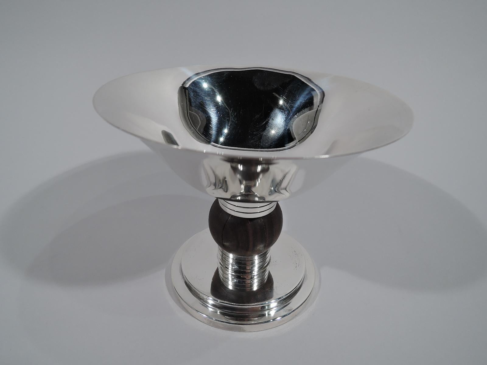 Edward VIII sterling silver and stained-wood compote. Made by Elkington & Co. in Birmingham in 1936. Wide conical bowl with curved bottom and stepped round foot. Cylindrical shaft with incised bands and stained-wood ball knop. Smart between-the-wars